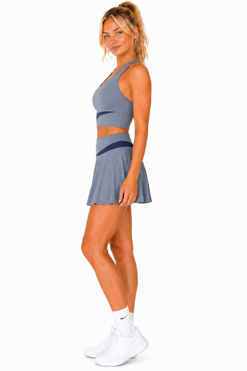 Women’s Pleated Tennis Skirt Set with Racer-back Crop Top
